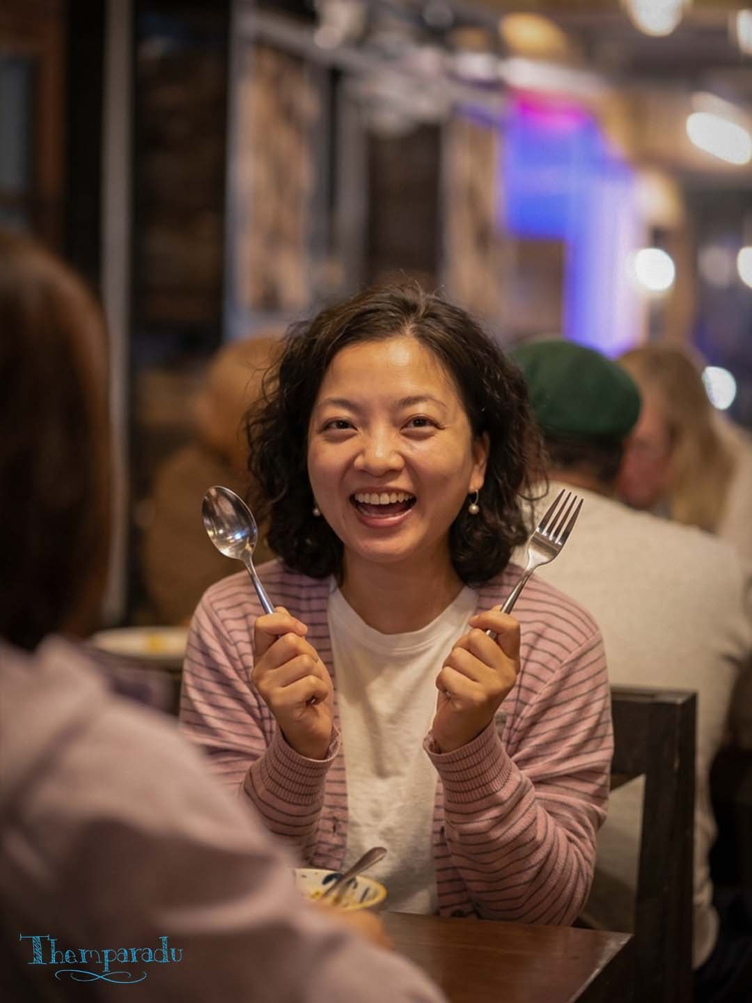 A smiling guest at Themparadu