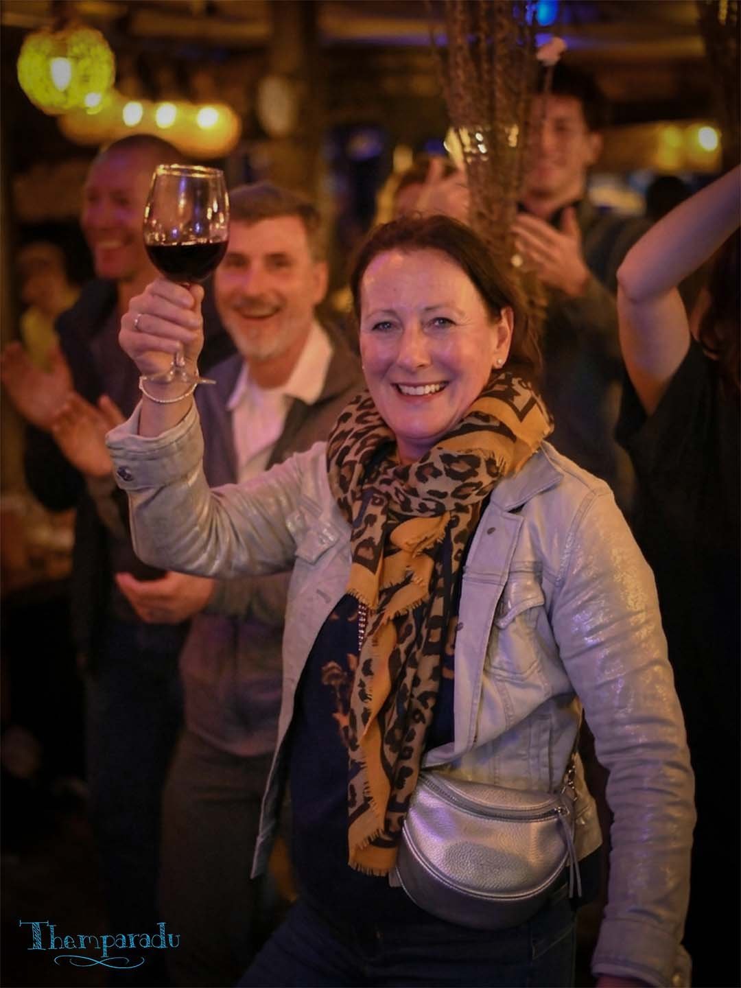 A guest raising a glass